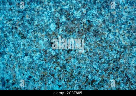 Texture of polished stone. Smooth surface of the granite slab. Stock Photo