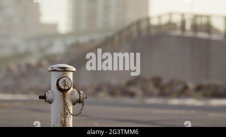Rusty Fire Hydrant at sunny day Stock Photo