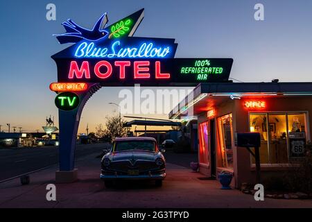 Tucamcari, New Mexico - May 6, 2021: Close up of the Blue Swallow Motel neon sign, a famous classic Route 66 motel Stock Photo