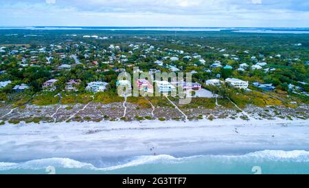 Aerial view of a coast with a beach and waves. Homes on the water in Captiva, Florida Stock Photo