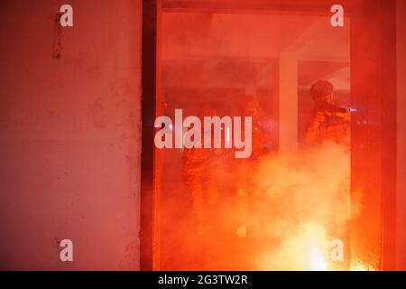 Military troops in action urban environment Stock Photo