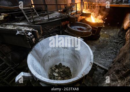 Special metallurgical ladles. The process of pouring molten metal Stock Photo