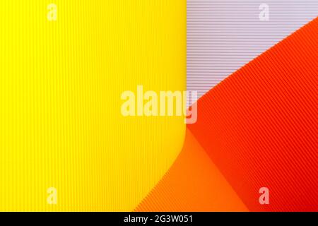 Abstract background from sheets of colored paper Stock Photo