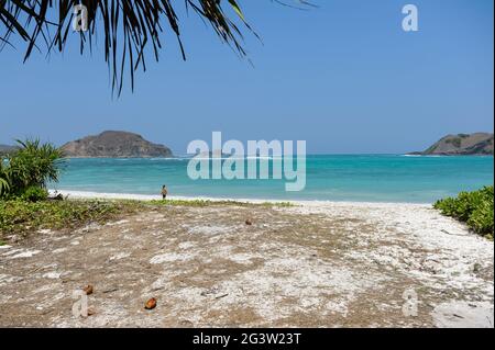 10.09.2011, Lombok, West Nusa Tenggara, Indonesia, Asia - Almost deserted and pristine white sand on Tanjung Aan Beach with turquoise water. Stock Photo