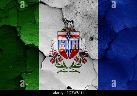 Flag of Yukon painted on cracked wall Stock Photo