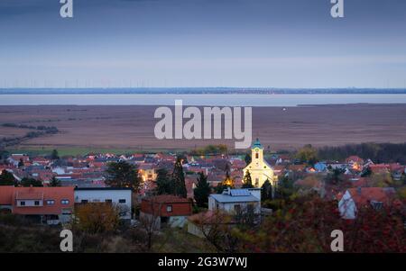 Oggau on lake Neusiedlersee with church early in the morning Stock Photo