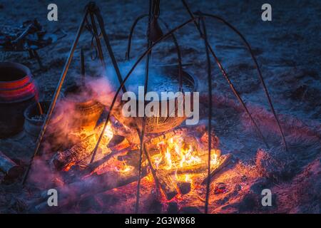 Boiling cauldron with mysterious decoction at Kupala Night Stock Photo
