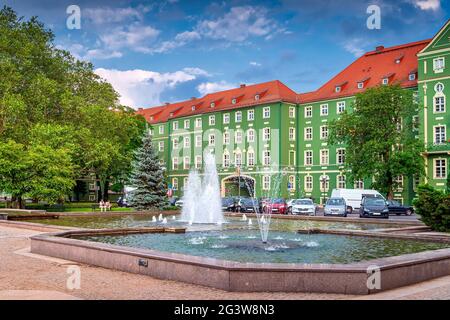 Fountains in front of green buildings of Szczecin city council Stock Photo