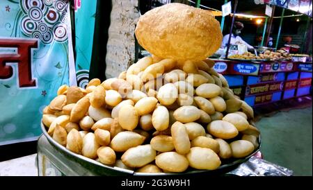 Lucknow, uttar pradesh - january 2021 : Paani Poori is an Indian street food snack that nobody can resist. Stock Photo