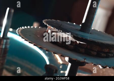 Sharp circular saw blades close up. Dangerous machine to cut up from horror films. Stock Photo