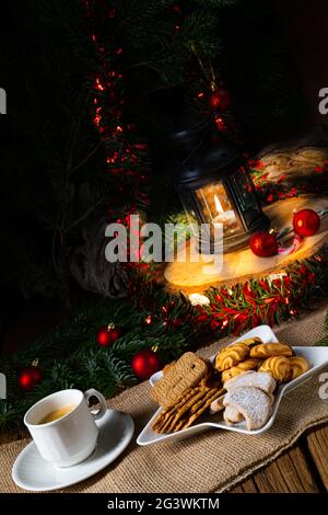 Different types of biscuits with rustic Christmas decorations Stock Photo