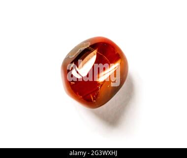 Carnelian agate gemstone isolated on a white background Stock Photo