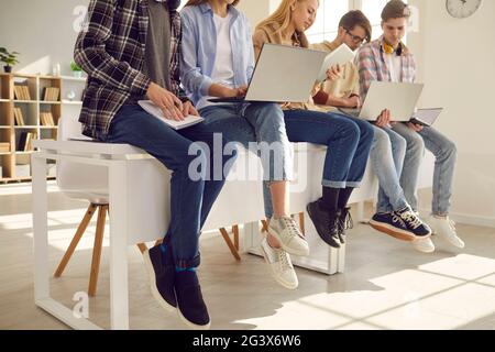 Middle section teenager secondary or high school student studying at class Stock Photo