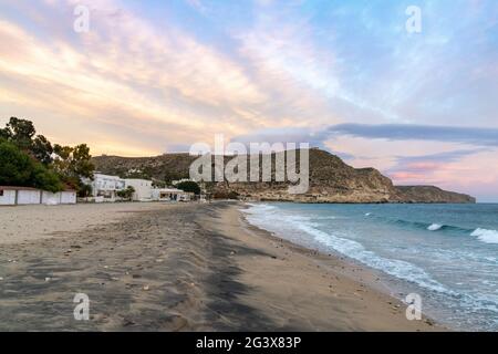 Beach and village of Agua Amarga in Andalusia at sunset Stock Photo