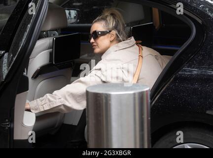 London, UK. 18th June, 2021. Radio presenter, Ashley Roberts, leaves the studios of Global Radio after presenting her Heart FM show. Credit: Mark Thomas/Alamy Live News Stock Photo