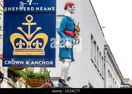 Shoreham, June 11th 2021: The huge sailor effigy outside The Crown and Anchor pub in the High Street in Shoreham-by-Sea, West Sussex Stock Photo