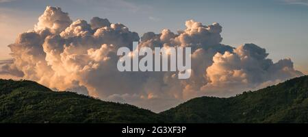 Storm clouds gather to the north of Hong Kong in summer Stock Photo
