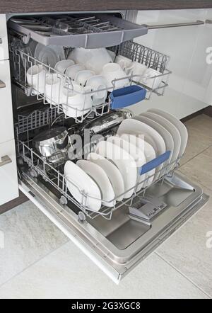 Clean dishes in the dishwasher Stock Photo