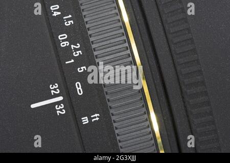 Camera lens with focus ring and distance scale Stock Photo