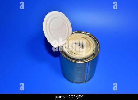 Dollars in tin can. Keeping Stack of money rolls 100 american hundred in metal food can. Large bundle of US one hundred dollar bills. Problem of corru Stock Photo