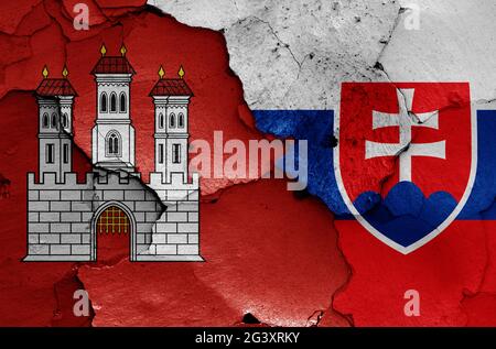 Flags of Bratislava and Slovakia painted on cracked wall Stock Photo