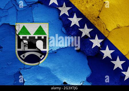 Flags of Sarajevo and Bosnia and Herzegovina painted on cracked wall Stock Photo