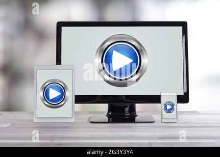 Play concept shown on different information technology devices Stock Photo
