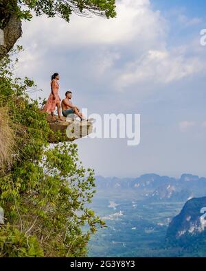Asian woman hiking in jungle Stock Photo - Alamy