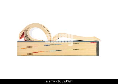 Closeup group of stacked thick books isolated on white background. Stock Photo