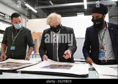 Prime Minister Boris Johnson talks lecturers in the Arts and Design department during a visit to Kirklees College Springfield Sixth Form Centre in Dewsbury, West Yorkshire. Picture date: Friday June 18, 2021. Stock Photo