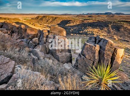 Boulders over ravine in foreground, distant mountains in Chihuahuan Desert, seen from viewpoint in Davis Mountains State Park, Fort Davis, Texas, USA Stock Photo