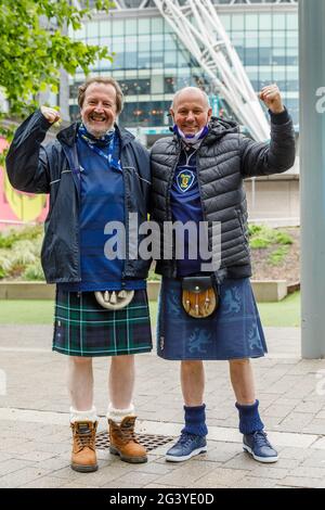 Wembley Stadium, Wembley Park, UK. 18th June, 2021. Scotland fans arrived in Wembley early this morning, despite torrential rain across London. Scotland will face England in their 2nd Group D match of the UEFA European Football Championship at Wembley Stadium this evening with an 8pm kick off. Credit: amanda rose/Alamy Live News Stock Photo