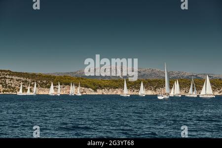 Beautiful sea landscape with sailboats, the race of sailboats on the horizon, a regatta, a Intense competition, bright colors, i Stock Photo
