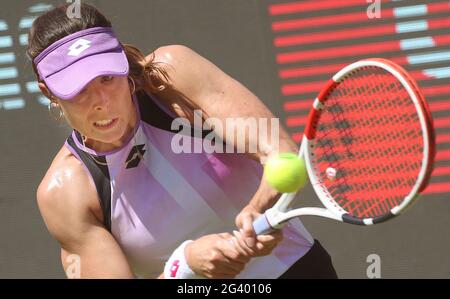 Berlin, Germany. 18th June, 2021. Tennis: WTA Tour, Singles, Quarterfinals Muguruza (Spain) - Cornet (France) at Steffi Graf Stadium. Alize Cornet plays a backhand. Credit: Wolfgang Kumm/dpa/Alamy Live News Stock Photo