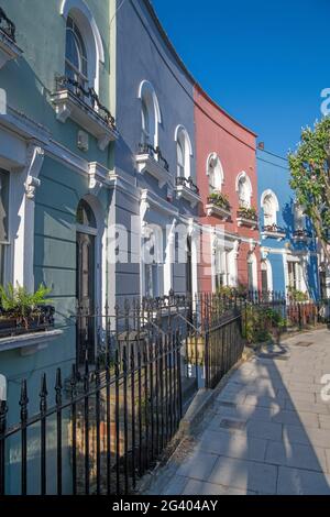 Colourful painted terraced houses Kelly Street Kentish Town London Stock Photo