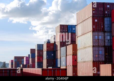 Arranging containers in the port Stock Photo