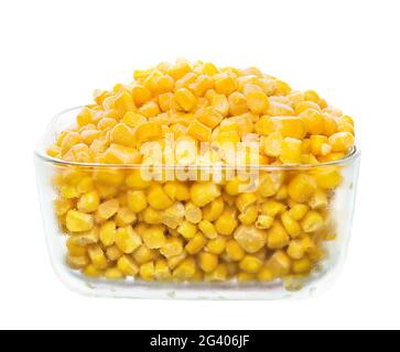 Frozen organic cut corn in bowl isolated on white background Stock Photo