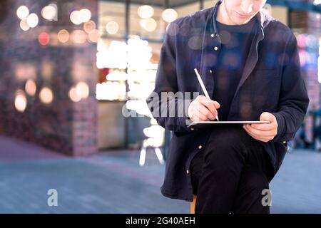 digital designer making the illustration on the tablet with stylus Stock Photo
