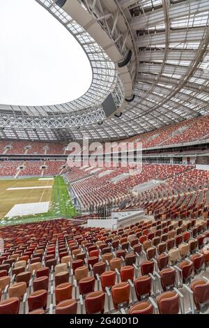 Empty seats on the tribune of a soccer stadium Stock Photo
