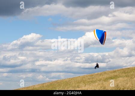 DEVILS DYKE, BRIGHTON/SUSSEX - JULY 22 : Paragliding at Devil's Dyke near Brighton on July 22, 2011. Unidentified person. Stock Photo