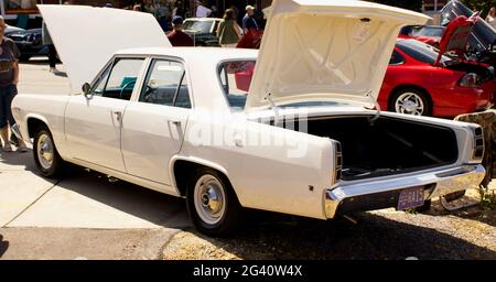 A Side and Rear View of a 1968 Plymouth Valiant Stock Photo