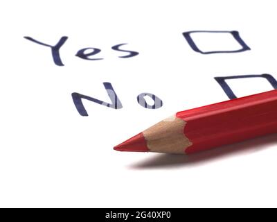 yes and no check boxes on white paper and red pencil Stock Photo