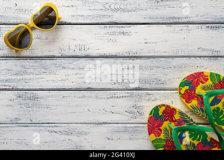 Flat lay photography of Summer items, glasses, slippers, Stock Photo