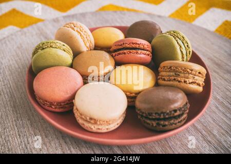 Macarons on plate Stock Photo