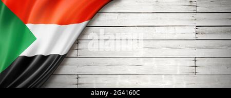 Sudan flag on old white wall banner Stock Photo