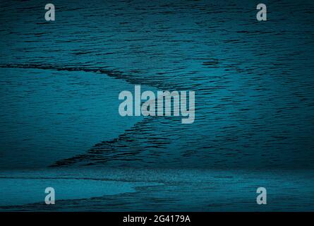 Vintage grunge blue concrete texture studio wall background with vignette. Stock Photo