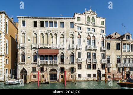 Motorboat cruising down the Grand Canal Stock Photo