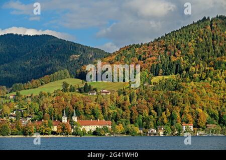 View over the Tegernsee to St. Quirin Monastery Church and Tegernsee Monastery, Tegernsee, Upper Bavaria, Bavaria, Germany Stock Photo