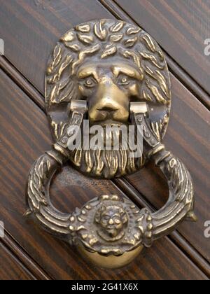 RONDA, ANDALUCIA/SPAIN - MAY 8 : Brass Lion door knocker on a building in Ronda Spain on May 8, 2014 Stock Photo