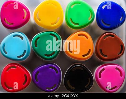 Colored markers for drawing on a white background, close-up. Stock Photo